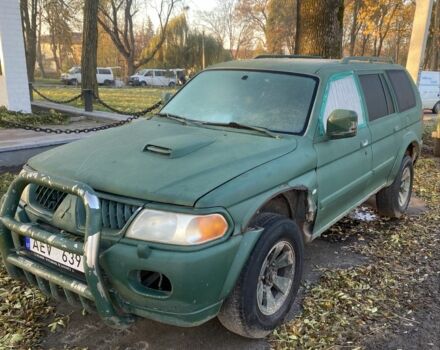 Зеленый Мицубиси Паджеро Спорт, объемом двигателя 2.5 л и пробегом 258 тыс. км за 2026 $, фото 1 на Automoto.ua