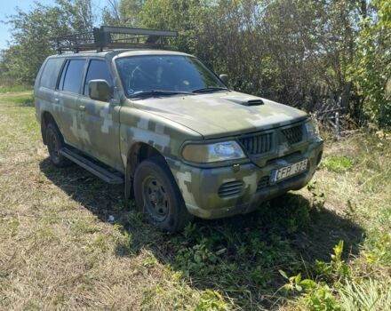 Зелений Міцубісі Паджеро Спорт, об'ємом двигуна 2.5 л та пробігом 280 тис. км за 4950 $, фото 1 на Automoto.ua