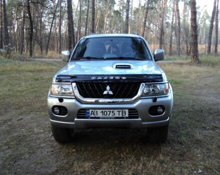 Зеленый Мицубиси Паджеро Спорт, объемом двигателя 2.5 л и пробегом 250 тыс. км за 9500 $, фото 1 на Automoto.ua