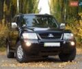 Черный Мицубиси Паджеро Вагон, объемом двигателя 3 л и пробегом 140 тыс. км за 11500 $, фото 1 на Automoto.ua