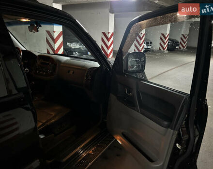 Черный Мицубиси Паджеро Вагон, объемом двигателя 3.2 л и пробегом 254 тыс. км за 10600 $, фото 44 на Automoto.ua