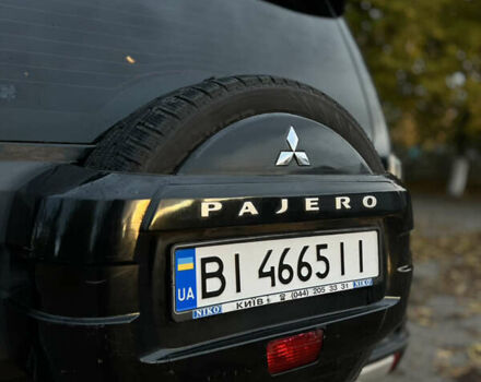 Чорний Міцубісі Паджеро Вагон, об'ємом двигуна 3.8 л та пробігом 208 тис. км за 11500 $, фото 15 на Automoto.ua