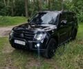 Черный Мицубиси Паджеро Вагон, объемом двигателя 3 л и пробегом 160 тыс. км за 14000 $, фото 1 на Automoto.ua