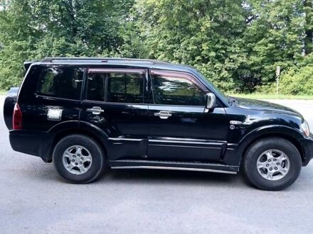 Черный Мицубиси Паджеро Вагон, объемом двигателя 3.2 л и пробегом 300 тыс. км за 9500 $, фото 1 на Automoto.ua