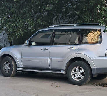 Серый Мицубиси Паджеро Вагон, объемом двигателя 3 л и пробегом 242 тыс. км за 10000 $, фото 1 на Automoto.ua