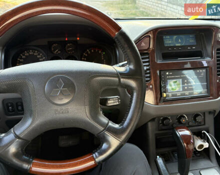 Синий Мицубиси Паджеро Вагон, объемом двигателя 3 л и пробегом 223 тыс. км за 9500 $, фото 4 на Automoto.ua