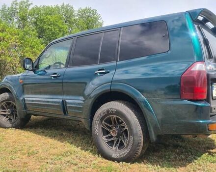 Зеленый Мицубиси Паджеро Вагон, объемом двигателя 3.5 л и пробегом 300 тыс. км за 8000 $, фото 1 на Automoto.ua