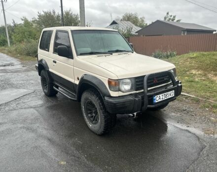 Белый Мицубиси Паджеро, объемом двигателя 3 л и пробегом 280 тыс. км за 6400 $, фото 1 на Automoto.ua