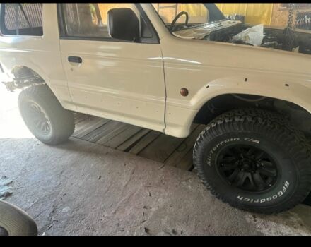 Белый Мицубиси Паджеро, объемом двигателя 3 л и пробегом 280 тыс. км за 6400 $, фото 9 на Automoto.ua