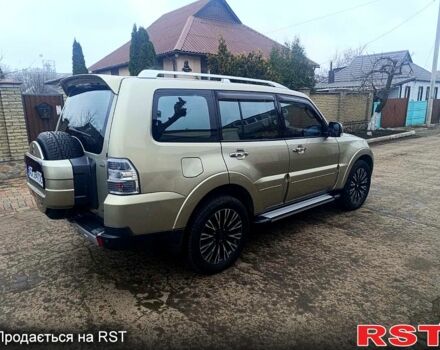 Бежевий Міцубісі Паджеро, об'ємом двигуна 30 л та пробігом 163 тис. км за 13299 $, фото 4 на Automoto.ua