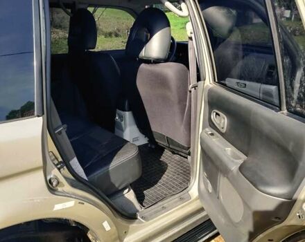 Бежевий Міцубісі Паджеро, об'ємом двигуна 3 л та пробігом 187 тис. км за 8900 $, фото 13 на Automoto.ua