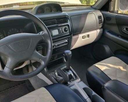 Бежевий Міцубісі Паджеро, об'ємом двигуна 3 л та пробігом 187 тис. км за 8900 $, фото 19 на Automoto.ua