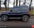 Чорний Міцубісі Паджеро, об'ємом двигуна 1.8 л та пробігом 230 тис. км за 6400 $, фото 3 на Automoto.ua