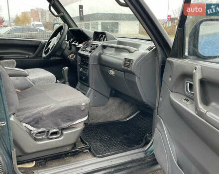 Чорний Міцубісі Паджеро, об'ємом двигуна 2.8 л та пробігом 222 тис. км за 7700 $, фото 13 на Automoto.ua