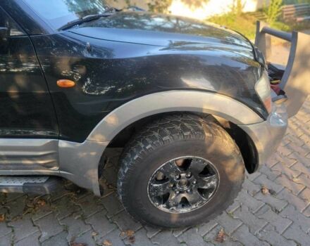 Чорний Міцубісі Паджеро, об'ємом двигуна 3.5 л та пробігом 313 тис. км за 6400 $, фото 2 на Automoto.ua