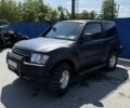 Чорний Міцубісі Паджеро, об'ємом двигуна 3.2 л та пробігом 100 тис. км за 11200 $, фото 1 на Automoto.ua