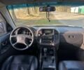 Черный Мицубиси Паджеро, объемом двигателя 3.2 л и пробегом 243 тыс. км за 6600 $, фото 4 на Automoto.ua
