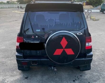 Чорний Міцубісі Паджеро, об'ємом двигуна 1 л та пробігом 2 тис. км за 2050 $, фото 2 на Automoto.ua