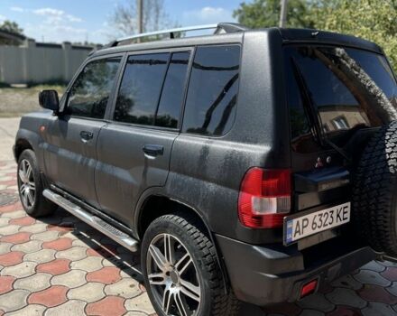 Черный Мицубиси Паджеро, объемом двигателя 1.8 л и пробегом 235 тыс. км за 5350 $, фото 3 на Automoto.ua
