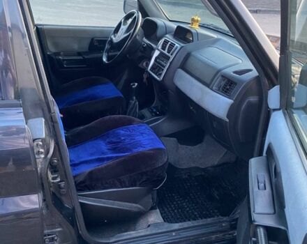 Чорний Міцубісі Паджеро, об'ємом двигуна 1 л та пробігом 2 тис. км за 2050 $, фото 5 на Automoto.ua