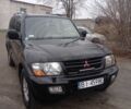 Черный Мицубиси Паджеро, объемом двигателя 3 л и пробегом 300 тыс. км за 4200 $, фото 1 на Automoto.ua