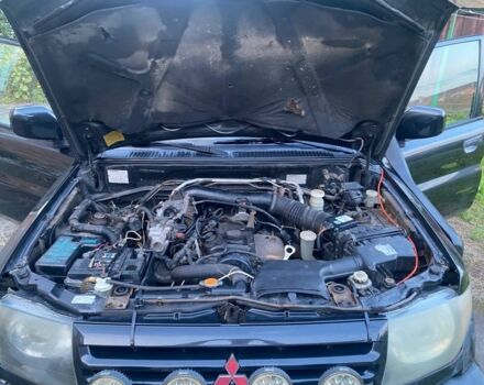 Чорний Міцубісі Паджеро, об'ємом двигуна 1 л та пробігом 2 тис. км за 2050 $, фото 6 на Automoto.ua