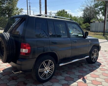 Черный Мицубиси Паджеро, объемом двигателя 1.8 л и пробегом 235 тыс. км за 5350 $, фото 2 на Automoto.ua