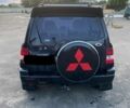 Чорний Міцубісі Паджеро, об'ємом двигуна 1.8 л та пробігом 250 тис. км за 2050 $, фото 3 на Automoto.ua
