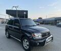 Чорний Міцубісі Паджеро, об'ємом двигуна 1.8 л та пробігом 265 тис. км за 3999 $, фото 2 на Automoto.ua