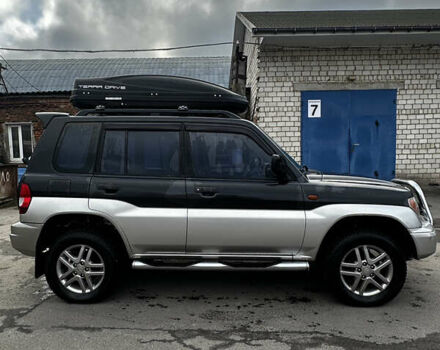 Чорний Міцубісі Паджеро, об'ємом двигуна 1.83 л та пробігом 229 тис. км за 4950 $, фото 2 на Automoto.ua