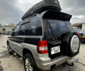 Чорний Міцубісі Паджеро, об'ємом двигуна 1.83 л та пробігом 229 тис. км за 4950 $, фото 5 на Automoto.ua