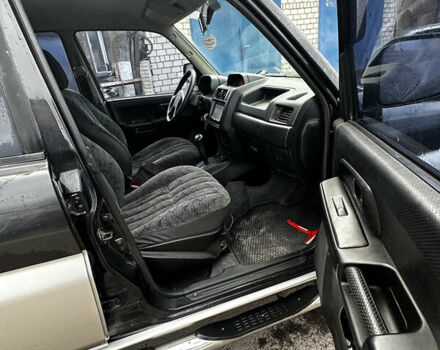 Чорний Міцубісі Паджеро, об'ємом двигуна 1.83 л та пробігом 229 тис. км за 4950 $, фото 10 на Automoto.ua