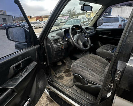 Чорний Міцубісі Паджеро, об'ємом двигуна 1.83 л та пробігом 229 тис. км за 4950 $, фото 7 на Automoto.ua