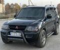 Черный Мицубиси Паджеро, объемом двигателя 3.2 л и пробегом 200 тыс. км за 7800 $, фото 1 на Automoto.ua