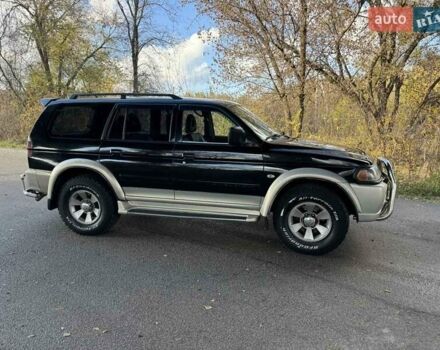 Черный Мицубиси Паджеро, объемом двигателя 3 л и пробегом 293 тыс. км за 4599 $, фото 14 на Automoto.ua
