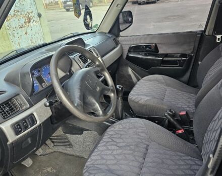 Чорний Міцубісі Паджеро, об'ємом двигуна 2 л та пробігом 200 тис. км за 2400 $, фото 3 на Automoto.ua