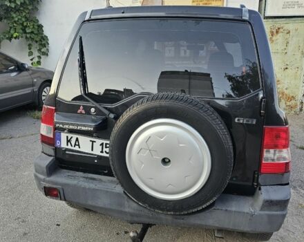 Чорний Міцубісі Паджеро, об'ємом двигуна 2 л та пробігом 200 тис. км за 2400 $, фото 4 на Automoto.ua