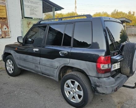 Чорний Міцубісі Паджеро, об'ємом двигуна 2 л та пробігом 200 тис. км за 2400 $, фото 1 на Automoto.ua