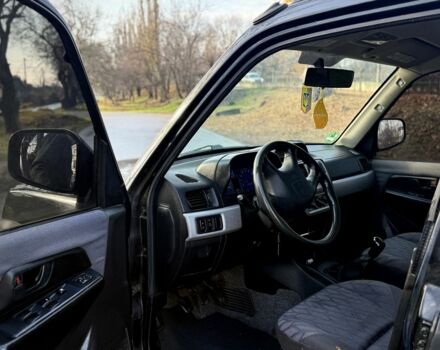 Черный Мицубиси Паджеро, объемом двигателя 2 л и пробегом 250 тыс. км за 3150 $, фото 10 на Automoto.ua