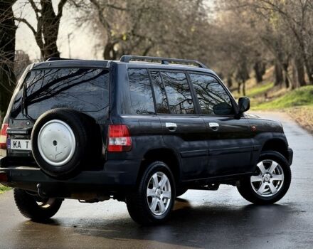 Черный Мицубиси Паджеро, объемом двигателя 2 л и пробегом 250 тыс. км за 3150 $, фото 1 на Automoto.ua