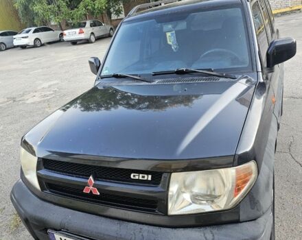 Черный Мицубиси Паджеро, объемом двигателя 2 л и пробегом 216 тыс. км за 2400 $, фото 3 на Automoto.ua