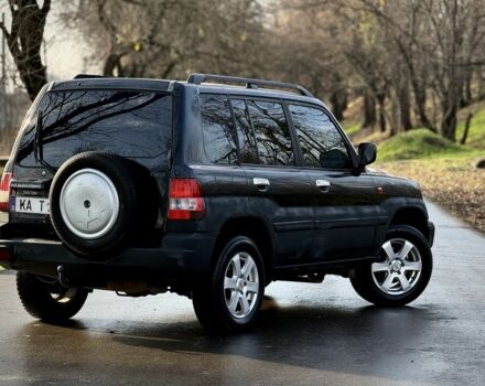 Черный Мицубиси Паджеро, объемом двигателя 2 л и пробегом 250 тыс. км за 3150 $, фото 5 на Automoto.ua