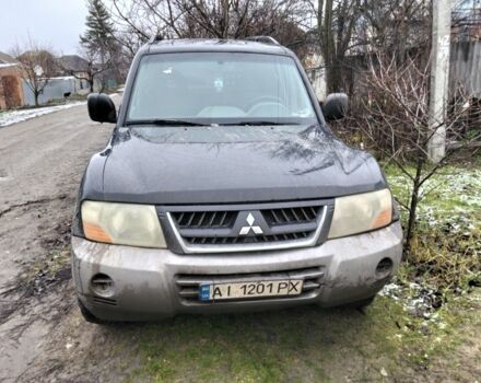 Черный Мицубиси Паджеро, объемом двигателя 3.2 л и пробегом 300 тыс. км за 4600 $, фото 1 на Automoto.ua