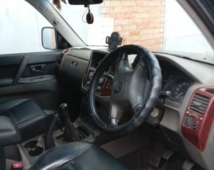 Черный Мицубиси Паджеро, объемом двигателя 3 л и пробегом 200 тыс. км за 4266 $, фото 1 на Automoto.ua