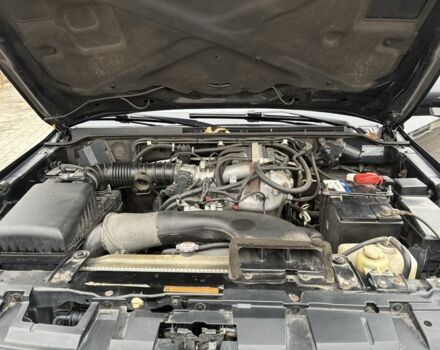 Чорний Міцубісі Паджеро, об'ємом двигуна 3 л та пробігом 192 тис. км за 10500 $, фото 6 на Automoto.ua