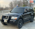 Чорний Міцубісі Паджеро, об'ємом двигуна 3.8 л та пробігом 260 тис. км за 10500 $, фото 1 на Automoto.ua