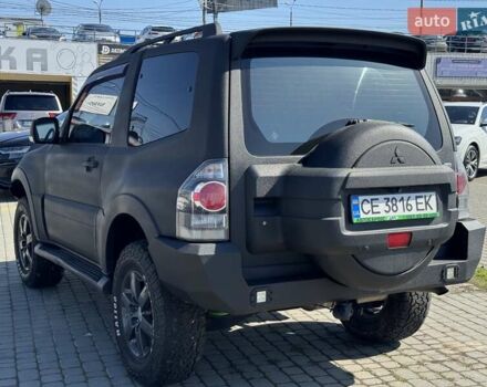 Чорний Міцубісі Паджеро, об'ємом двигуна 3.83 л та пробігом 254 тис. км за 16300 $, фото 11 на Automoto.ua