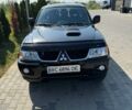 Черный Мицубиси Паджеро, объемом двигателя 2.48 л и пробегом 167 тыс. км за 9500 $, фото 1 на Automoto.ua