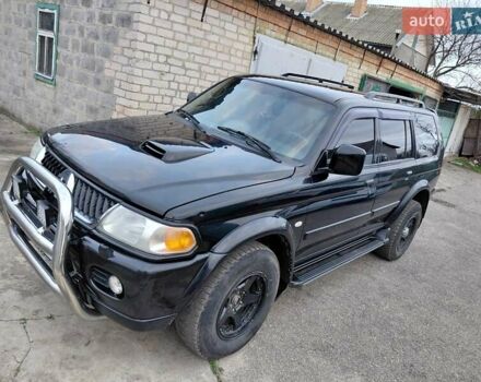 Черный Мицубиси Паджеро, объемом двигателя 2.48 л и пробегом 235 тыс. км за 12000 $, фото 7 на Automoto.ua