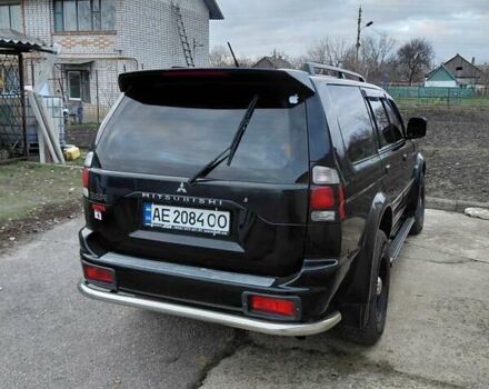 Черный Мицубиси Паджеро, объемом двигателя 2.48 л и пробегом 235 тыс. км за 12000 $, фото 1 на Automoto.ua